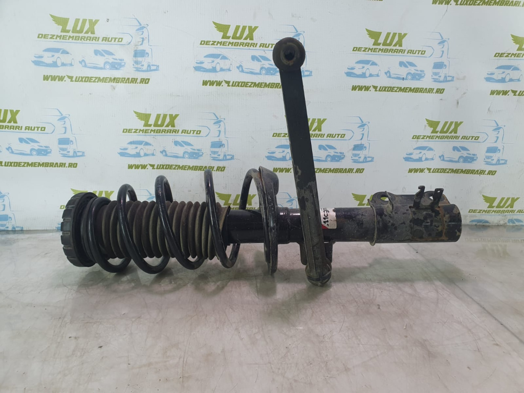 Amortizor cu arc stanga fata Chevrolet Aveo T300 [2011 - 2020] 1.3 cri A13DTE