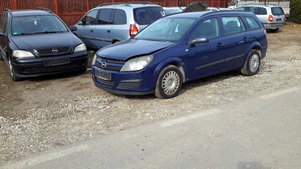 Ansamblu stergator cu motoras Opel Astra