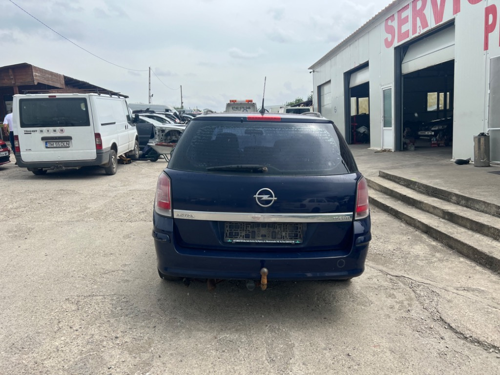 Ansamblu stergator cu motoras Opel Astra