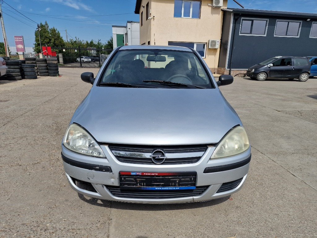 Ansamblu stergator cu motoras Opel Corsa C 2005 1.0 ECOTEC Z10XEP 44KW/60CP 236468 KM