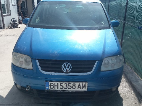 Ansamblu stergator cu motoras Volkswagen Touran 2006 MONOVOLUM 2.0 140 CP