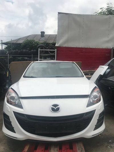 Ansamblu stergator Mazda 3 2010