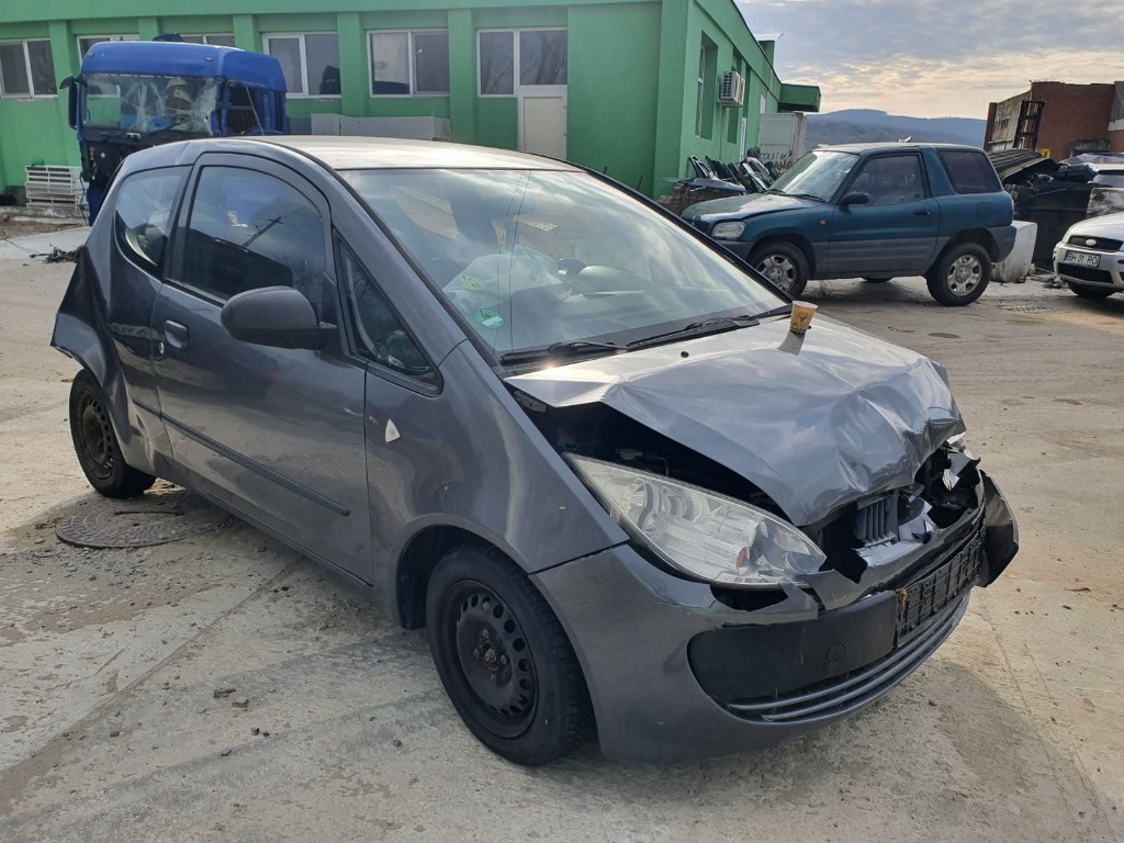 Aripa dreapta fata Mitsubishi Colt 2006 4 hatchback 1.1 benzina