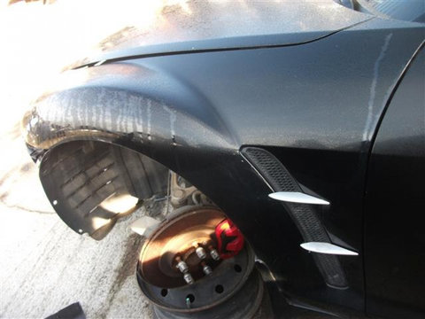 Aripa stanga fata + ornamente dirijor aer racire discuri Mazda RX 8 An 2005