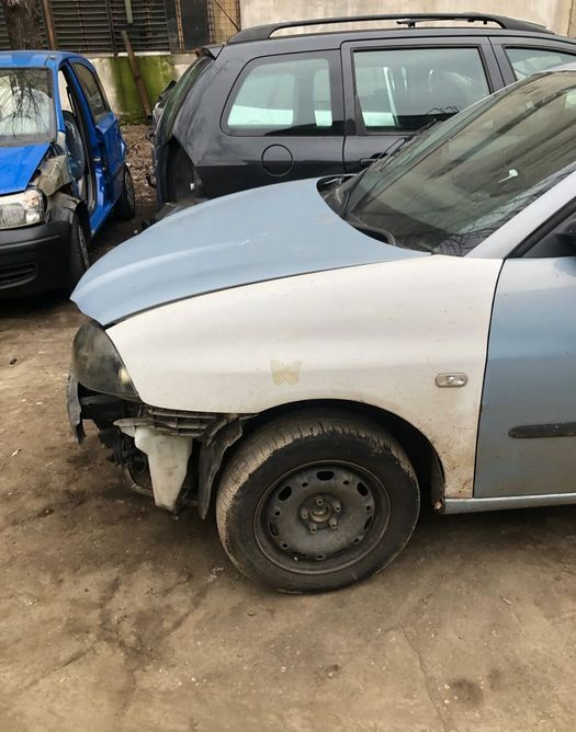 Aripa stanga fata Seat Ibiza/Cordoba alb 2003-2008