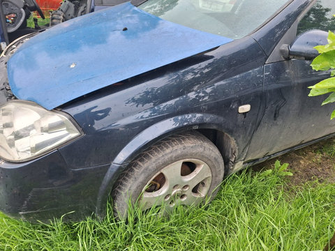 Aripa stanga Nissan Primera P12 1.6 benzina an 2007