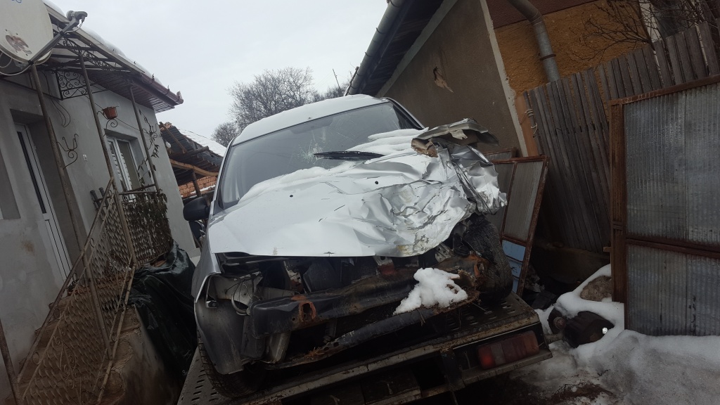 Aripa stanga spate Dacia Logan 2007 util