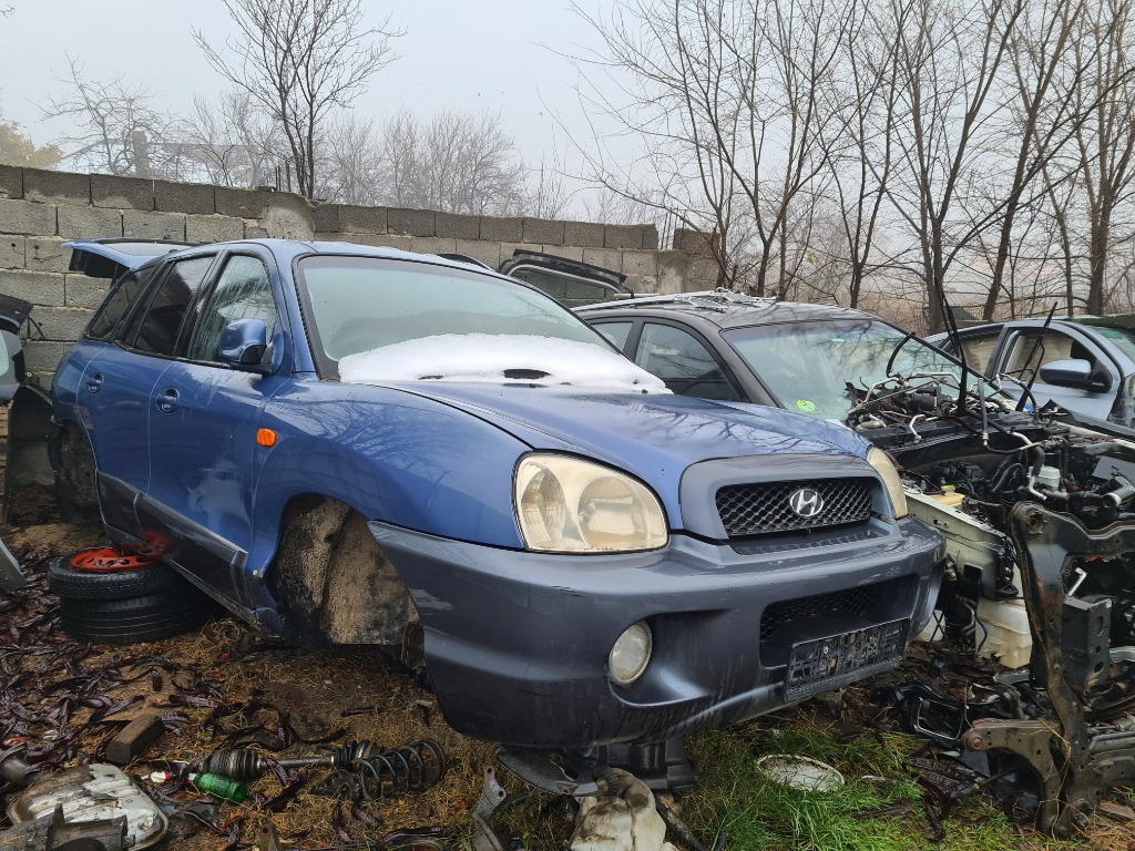 Aripa stanga spate Hyundai Santa Fe 2004