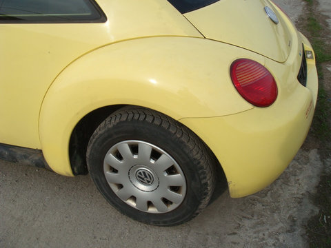 Aripa stanga spate VW BEETLE an 2001