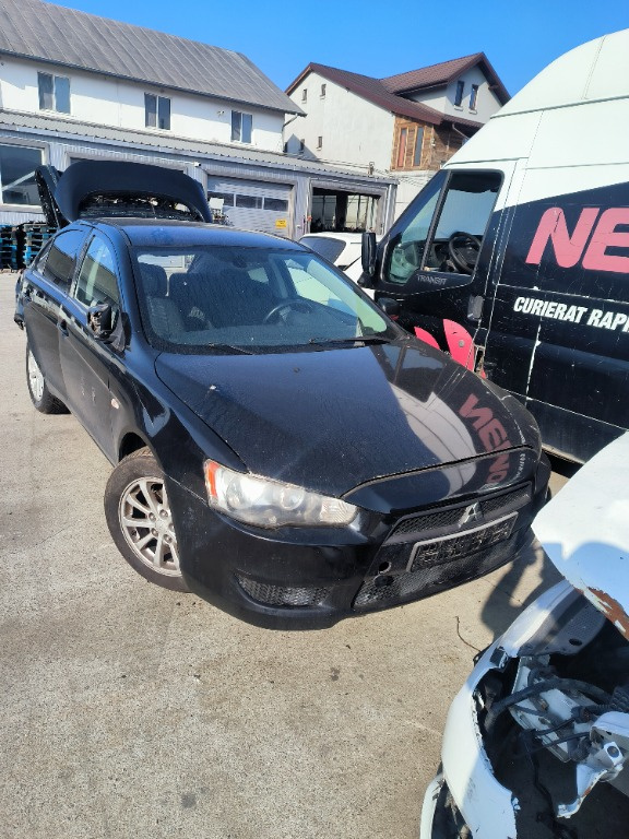 Broasca usa dreapta fata Mitsubishi Lancer 2010 SE