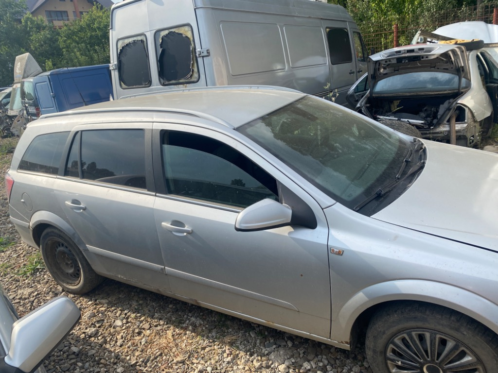 Broasca usa stanga fata Opel Astra H 200