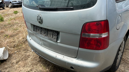 Broasca usa stanga fata Volkswagen Toura