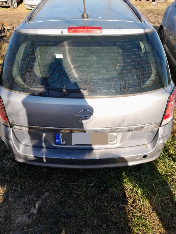 Broasca usa stanga spate Opel Astra H 20