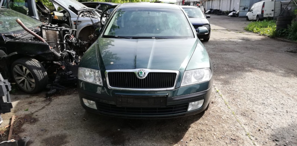 Broasca usa stanga spate Skoda Octavia II 2008 Berlina 1,6