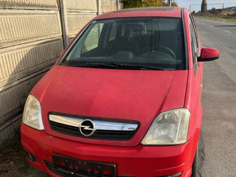 Butoane geam sofer Opel Meriva [facelift] [2004 - 2010] Minivan 5-usi 1.7 CDTi MT (100 hp) Opel Meriva 2008 1.7 CDTI 74KW,101cp,cod motor Z17DTR,cutie manuala in 6 trepte MZ4/M32 culoare rosie