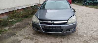 Butuc fals usa spate stanga Opel Astra H [2004 - 2