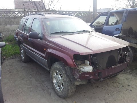 Capota Jeep Grand Cherokee 1999-2005 pe visiniu