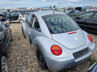 Carenaj roata stanga spate Volkswagen New Beetle 2