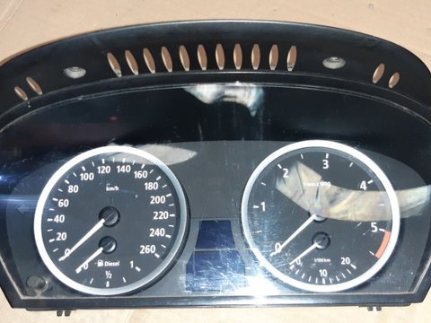 Ceasuri bord originale BMW Europa pentru modelul E60/E61. Cod: 6974576.