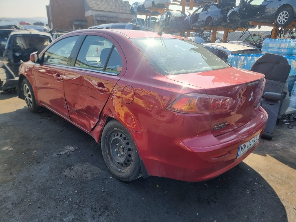 Consola centrala Mitsubishi Lancer 2013 berlina 1.8 d 4N13