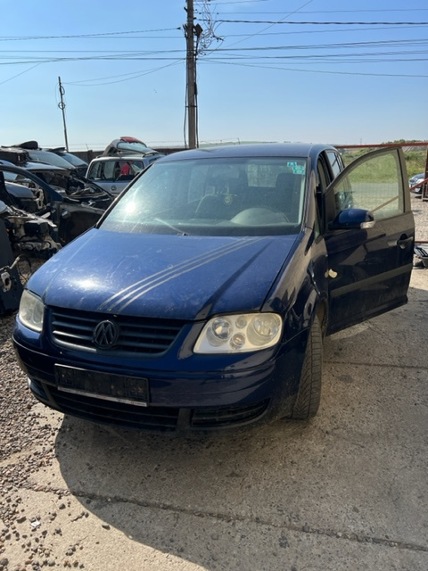 Dezmembram Volkswagen VW Touran [2003 - 2006] Minivan 1.9 TDI MT (100 hp) MOTOR AVQ 1.9 TDI 74KW 6 TREPTE COD CUTIE FYG CULOARE ALBASTRA