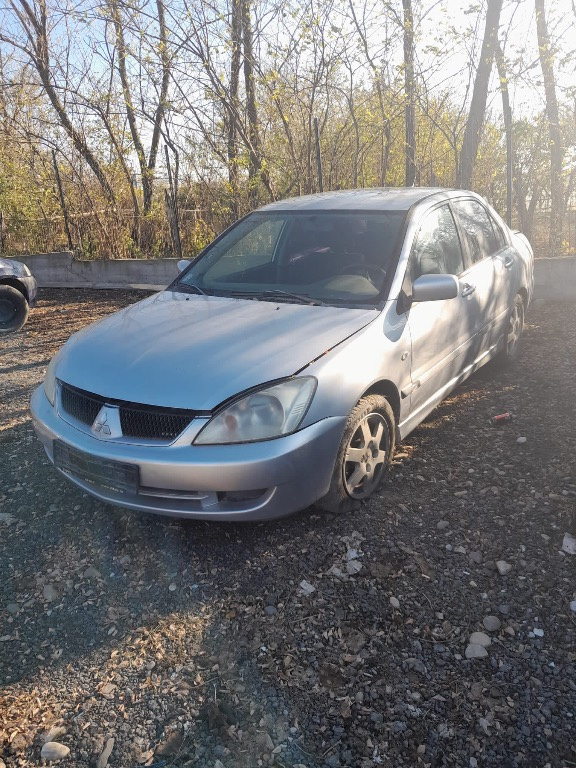 Dezmembrez Mitsubishi Lancer 1.6i