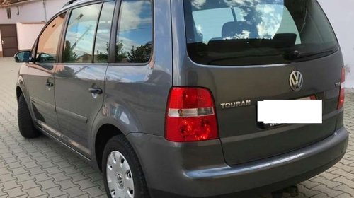 Dezmembrez Volkswagen Touran 1.9 TDI 200