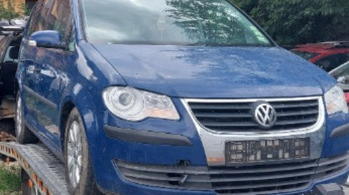 Dezmembrez VW TOURAN 1.9 BXE an 2008 fac