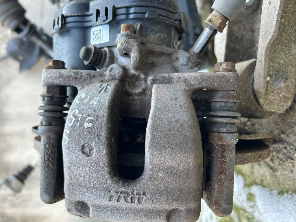 Etrier frana cu motoras stanga spate Mer