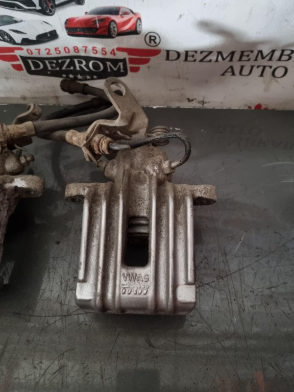 Etrier stanga / dreapta spate VW Golf V 