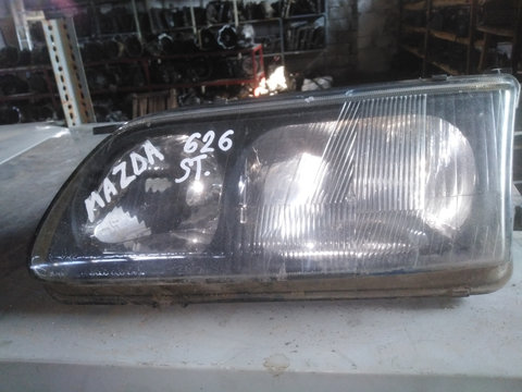 Far stanga Mazda 626 V, an 1997-2002, cod 1305235350