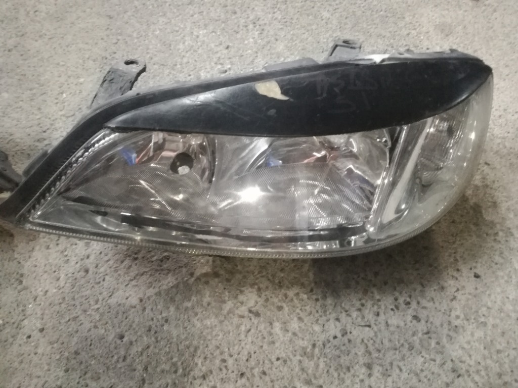 Far stanga Opel Astra G