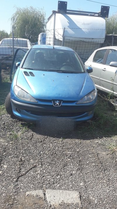 Far stanga Peugeot 206 1999