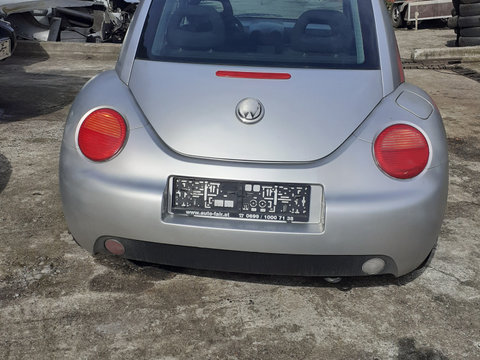 Far stanga Volkswagen Beetle 1999 Hatchback 1.4