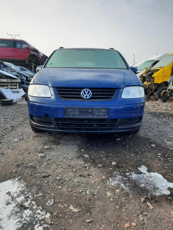 Far stanga Volkswagen Touran 2005 Break 2.0