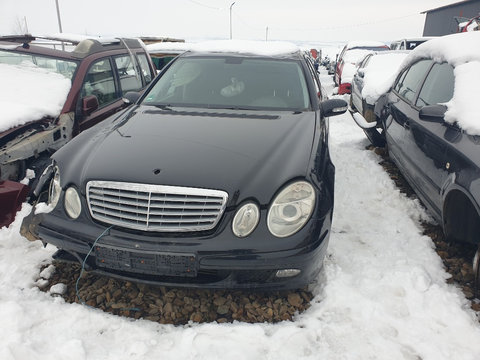 Far xenon stanga mercedes w211