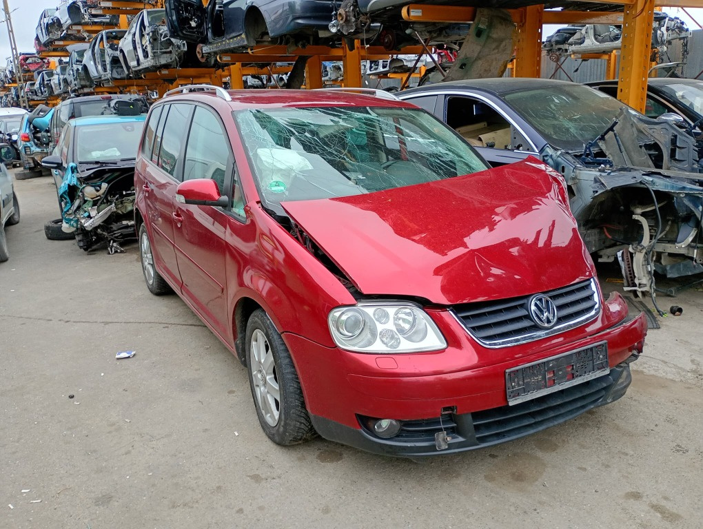 Galerie admisie Volkswagen Touran 2006 monovolum 1.9 tdi BXE