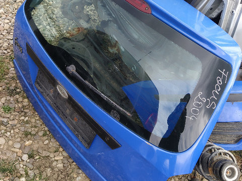 Haion albastru ford focus an 2004 cu luneta pret 300 ron