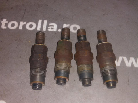 Injectoare set Mitsubishi L200, 2.5TD, an 2004.