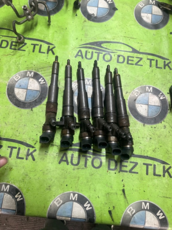 Injector bmw 730 seria 7 e66 e67 e65 3.0 d 7789661