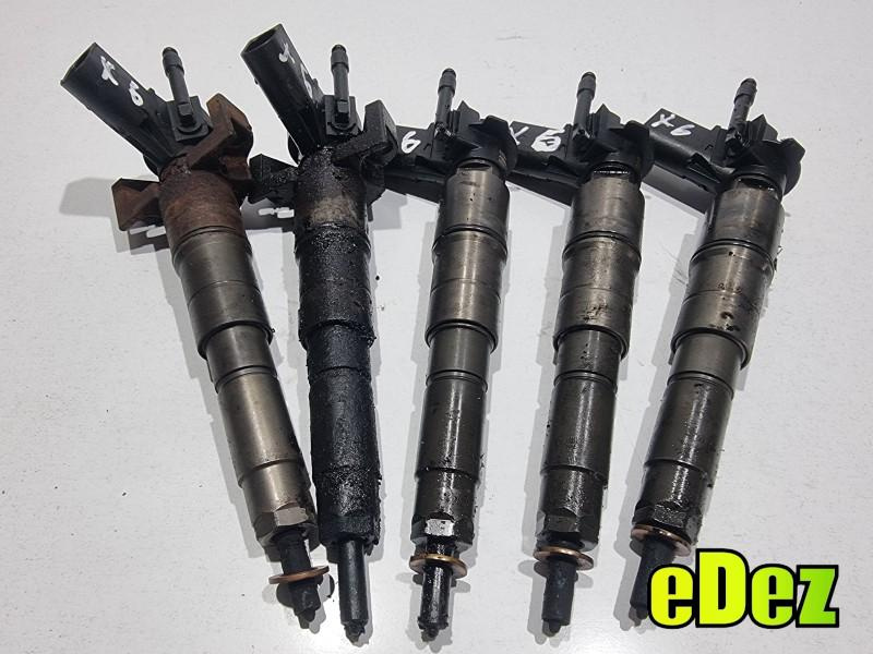 Injector BMW X5 (2007-2013) [E70] 3.0 d M57 286 cp 7808089