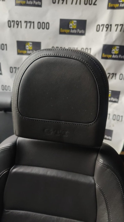 Interior GTI piele cu scaune electrice si incalzit