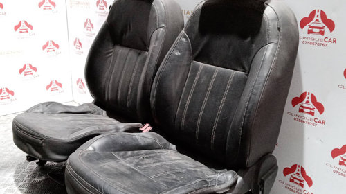Interior piele cu scaune cu reglaj elect