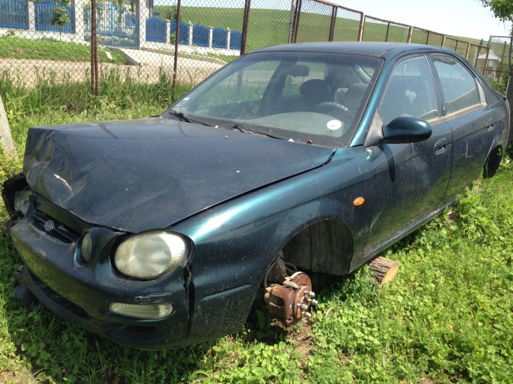 KIA SHUMA, 1.5 benzina, tip motor BF, 65 KW, verde, an 2000