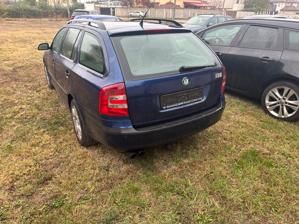 Macara geam stanga fata Skoda Octavia 2 