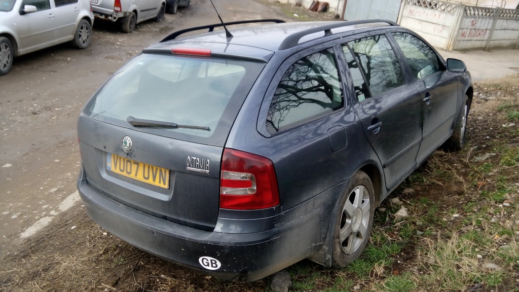 Macara geam stanga spate Skoda Octavia 2