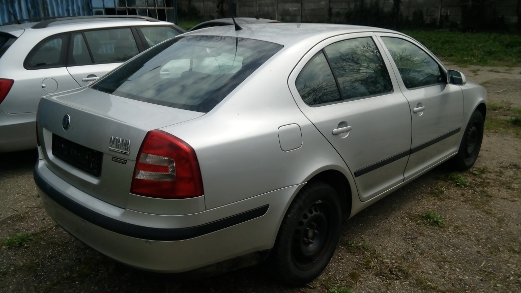 Macara geam stanga spate Skoda Octavia 2