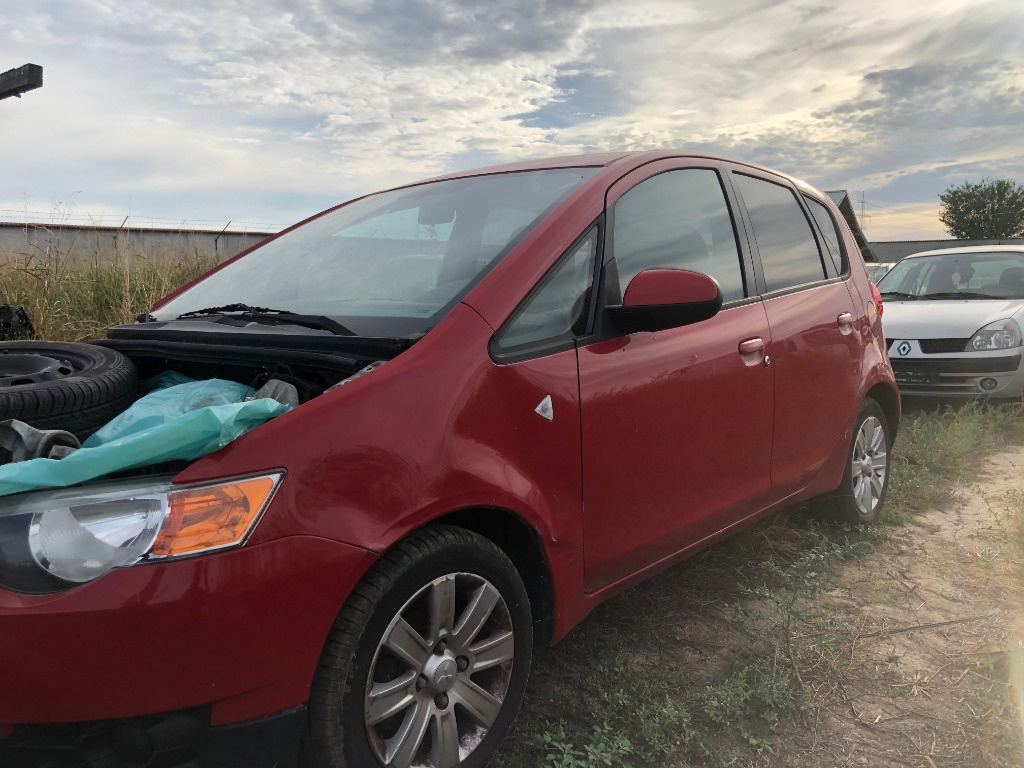 Maner usa stanga fata Mitsubishi Colt 2012 hatchback 1.1