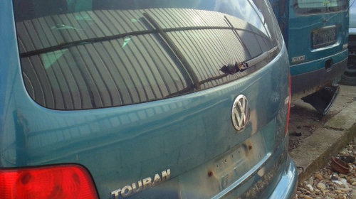 Mocheta portbagaj Volkswagen Touran 2004
