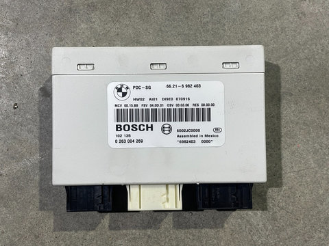 Modul PDC senzori parcare fata/spate Bmw E87/E90/E84 cod 6982403